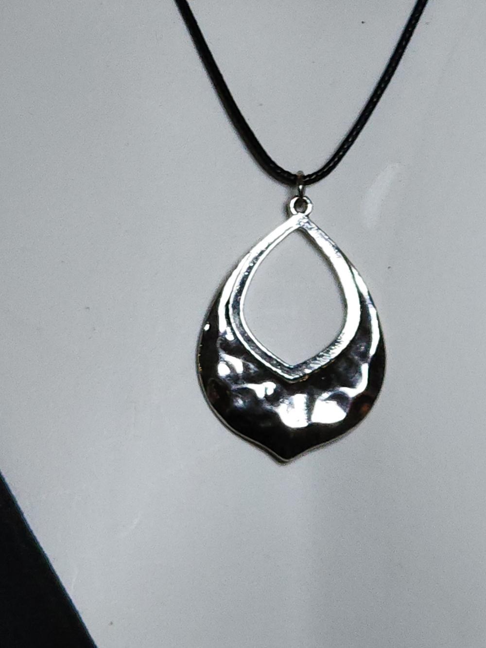 Silver Toned Teardrop Pendant Necklace On A Black Nylon Cord - Picture 2 of 8